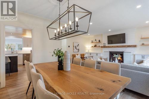 226 Forsyth Drive, Waterloo, ON - Indoor Photo Showing Dining Room With Fireplace