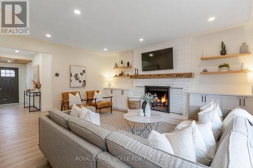 226 Forsyth Drive, Waterloo, ON - Indoor Photo Showing Living Room With Fireplace