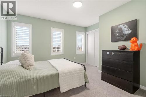 Bedroom featuring carpet flooring and a closet - 105 Larry Crescent, Caledonia, ON - Indoor Photo Showing Bedroom