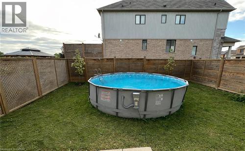 105 Larry Crescent, Caledonia, ON - Outdoor With Above Ground Pool