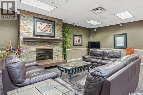 806 1867 Hamilton Street, Regina, SK - Indoor Photo Showing Living Room With Fireplace