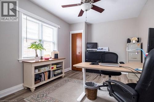 Office area featuring light wood-style floors and a ceiling fan - 143 Huxley Avenue S, Hamilton, ON - Indoor Photo Showing Office