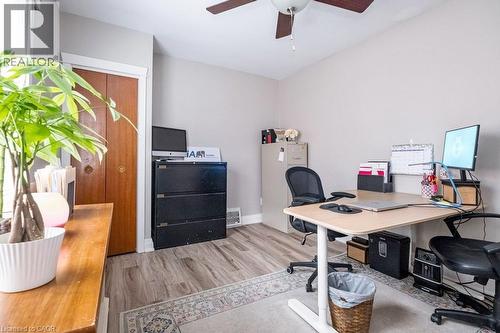Home office featuring light wood-type flooring and a ceiling fan - 143 Huxley Avenue S, Hamilton, ON - Indoor Photo Showing Office