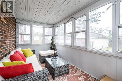 Sunroom with outdoor seating - 143 Huxley Avenue S, Hamilton, ON - Indoor Photo Showing Other Room