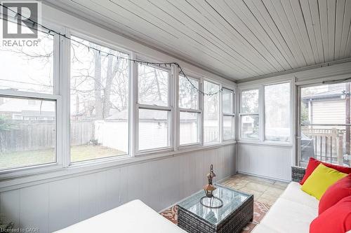 Sunroom / solarium featuring wooden walls and wooden ceiling - 143 Huxley Avenue S, Hamilton, ON - Indoor Photo Showing Other Room