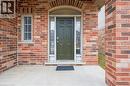 View of exterior entry featuring brick siding - 512 Wood Nettle Way, Waterloo, ON  - Outdoor With Exterior 
