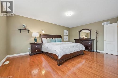 Bedroom featuring light wood-type flooring and baseboards - 512 Wood Nettle Way, Waterloo, ON - Indoor Photo Showing Bedroom