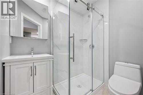 Bathroom featuring vanity and a stall shower - 512 Wood Nettle Way, Waterloo, ON - Indoor Photo Showing Bathroom
