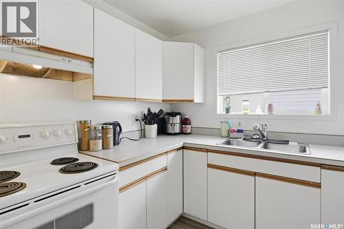 114 - 116 Barber Crescent, Saskatoon, SK - Indoor Photo Showing Kitchen With Double Sink