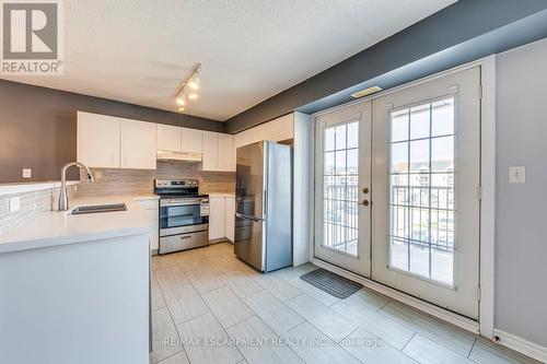 302 - 1411 Walkers Line, Burlington, ON - Indoor Photo Showing Kitchen With Double Sink
