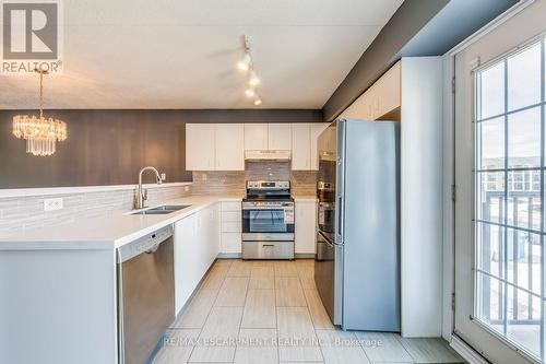 302 - 1411 Walkers Line, Burlington, ON - Indoor Photo Showing Kitchen With Double Sink