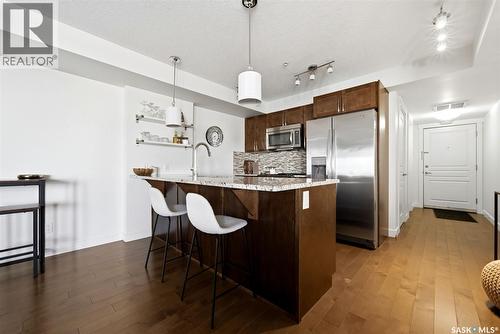 312 5301 Universal Crescent, Regina, SK - Indoor Photo Showing Kitchen With Upgraded Kitchen