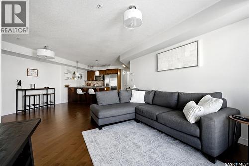312 5301 Universal Crescent, Regina, SK - Indoor Photo Showing Living Room