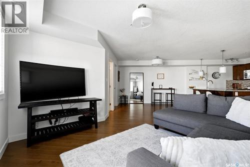 312 5301 Universal Crescent, Regina, SK - Indoor Photo Showing Living Room