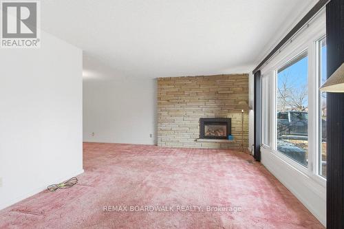 Hardwood Floors under Carpet - 1274 Maitland Avenue, Ottawa, ON - Indoor With Fireplace
