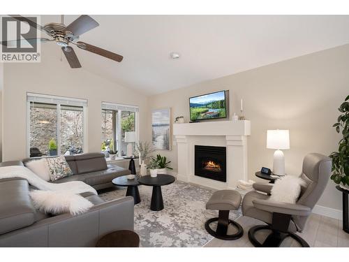 393 Rio Drive S, Kelowna, BC - Indoor Photo Showing Living Room With Fireplace