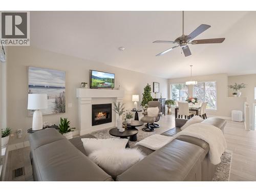 393 Rio Drive S, Kelowna, BC - Indoor Photo Showing Living Room With Fireplace