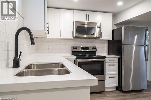 1141 Mohawk Road E, Hamilton, ON - Indoor Photo Showing Kitchen With Double Sink With Upgraded Kitchen