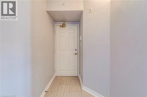 Corridor featuring baseboards - 1411 Walker'S Line Unit# 302, Burlington, ON - Indoor Photo Showing Other Room