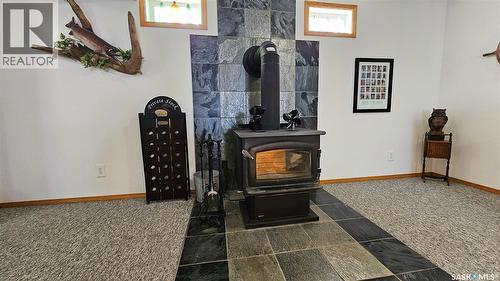 47 Ferguson Bay, Webb Rm No. 138, SK - Indoor Photo Showing Other Room With Fireplace