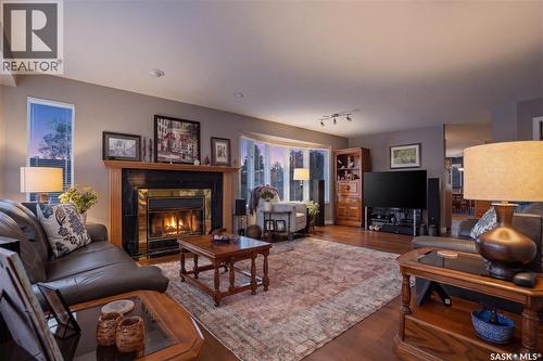 250 Bornstein Court, Saskatoon, SK - Indoor Photo Showing Living Room With Fireplace