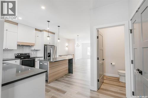 803 2Nd Street E, Saskatoon, SK - Indoor Photo Showing Kitchen With Stainless Steel Kitchen With Upgraded Kitchen