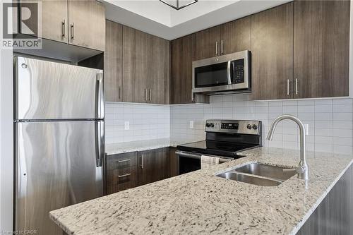 560 North Service Road Unit# 708, Grimsby, ON - Indoor Photo Showing Kitchen With Double Sink With Upgraded Kitchen