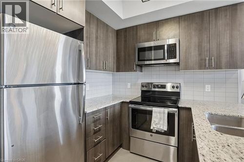 560 North Service Road Unit# 708, Grimsby, ON - Indoor Photo Showing Kitchen With Double Sink With Upgraded Kitchen