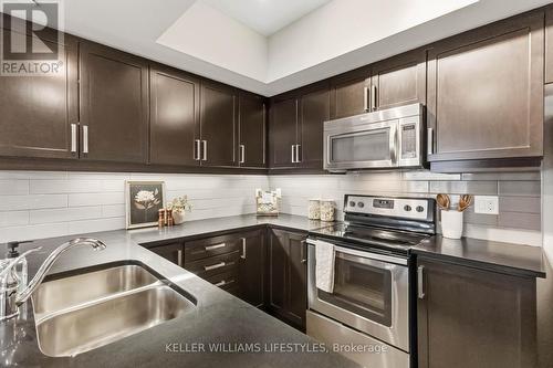 305 - 89 Ridout Street S, London South (South F), ON - Indoor Photo Showing Kitchen With Stainless Steel Kitchen With Double Sink With Upgraded Kitchen