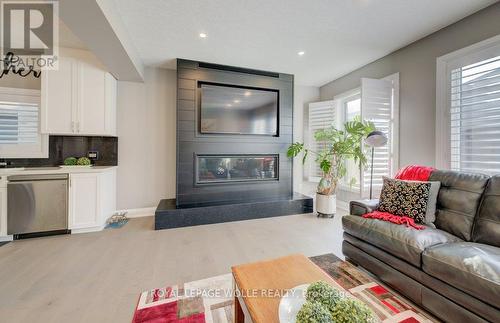 43 Greyhawk Street, Kitchener, ON - Indoor Photo Showing Living Room With Fireplace