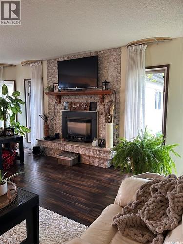 1533 Thorn Crescent, Estevan, SK - Indoor Photo Showing Living Room With Fireplace