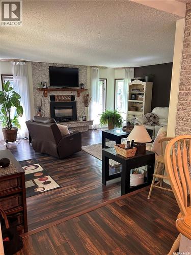 1533 Thorn Crescent, Estevan, SK - Indoor Photo Showing Living Room With Fireplace