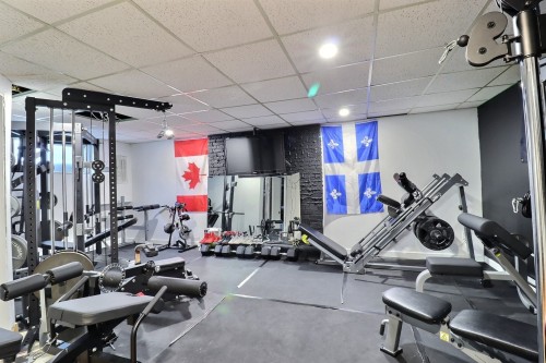 Salle familiale - 488 Place Garon, Rouyn-Noranda, QC - Indoor Photo Showing Gym Room