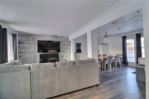 Vue d'ensemble - 488 Place Garon, Rouyn-Noranda, QC - Indoor Photo Showing Living Room With Fireplace