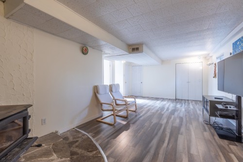 Sous-sol - 266 8E Avenue, L'Île-Perrot, QC - Indoor Photo Showing Living Room With Fireplace