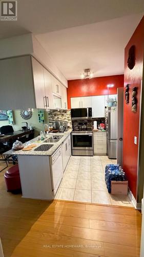 Updated kitchen  with updated appliances. - 108 - 50 Disera Drive, Vaughan, ON - Indoor Photo Showing Kitchen With Double Sink With Upgraded Kitchen