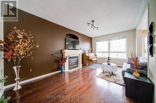 3696 Waterfall Crescent, Mississauga, ON - Indoor Photo Showing Living Room With Fireplace