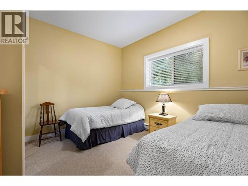 7799 Golf Course Road, Anglemont, BC - Indoor Photo Showing Bedroom