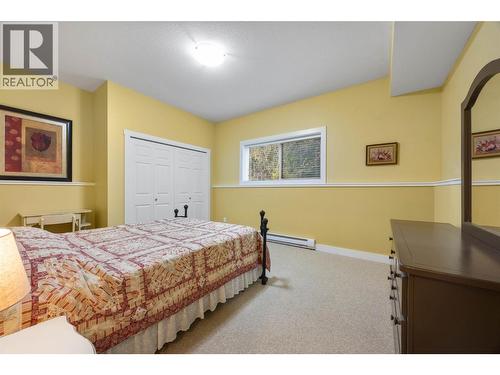 7799 Golf Course Road, Anglemont, BC - Indoor Photo Showing Bedroom