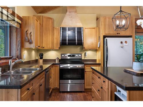 7799 Golf Course Road, Anglemont, BC - Indoor Photo Showing Kitchen With Double Sink