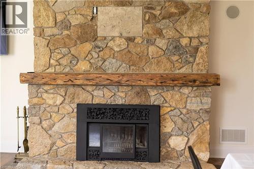 wood fireplace - 2019 Dundas Street, Burlington, ON - Indoor Photo Showing Living Room With Fireplace