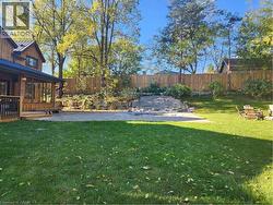 Fenced backyard with a patio area - 