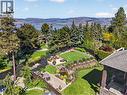 The perfect family home with no shortage of space! - 336 Quilchena Drive, Kelowna, BC  - Outdoor With Facade 