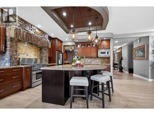 With an concrete patio - 336 Quilchena Drive, Kelowna, BC - Outdoor With Deck Patio Veranda