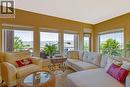 Lots of windows throughout - 610 Arrowleaf Lane, Kelowna, BC  - Indoor Photo Showing Living Room 