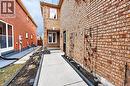 Property entrance with brick siding and a patio area - 3753 Densbury Drive, Mississauga, ON  - Outdoor 