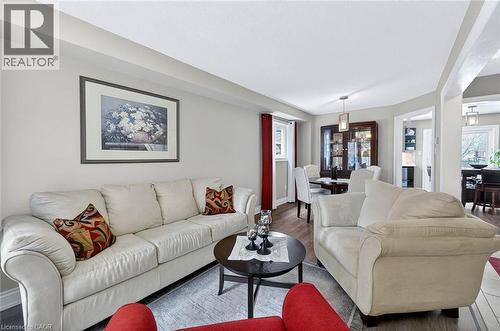 Living area featuring wood finished floors and baseboards - 3753 Densbury Drive, Mississauga, ON - Indoor Photo Showing Living Room