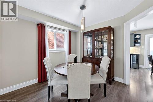 Dining room featuring dark wood-type flooring and beverage cooler - 3753 Densbury Drive, Mississauga, ON - Indoor Photo Showing Dining Room
