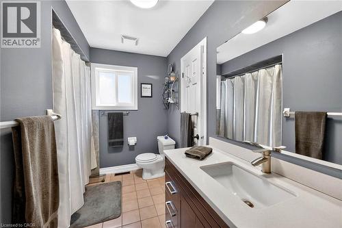 Bathroom featuring vanity, light tile patterned floors, and a shower with shower curtain - 3753 Densbury Drive, Mississauga, ON - Indoor Photo Showing Bathroom