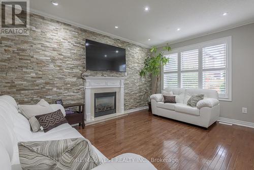 17 Hawkridge Trail, Brampton, ON - Indoor Photo Showing Living Room With Fireplace